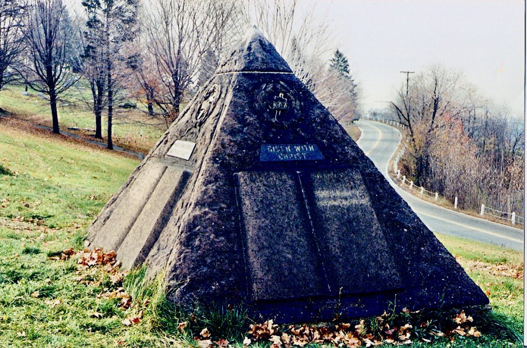 Reverse side of Charles Taze Russell's pyramid, again with crown and cross near the top